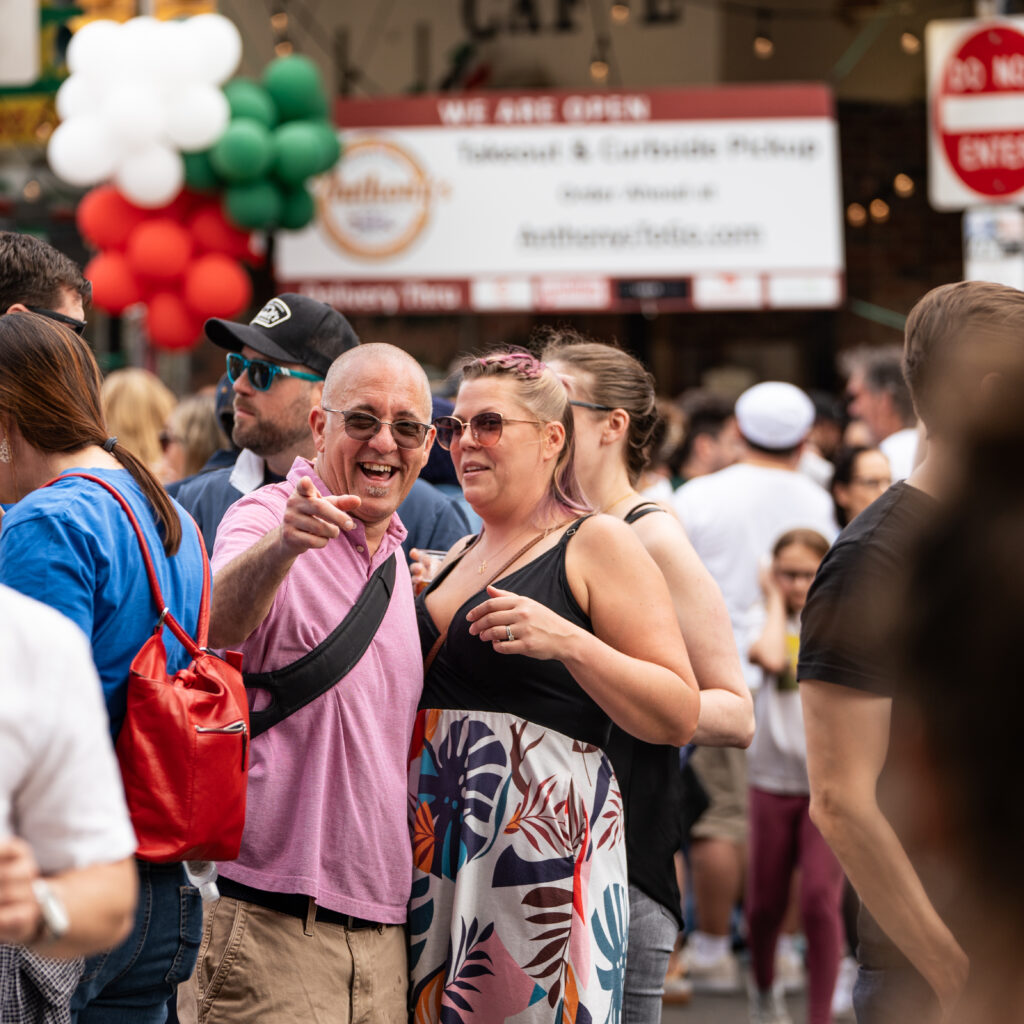 People celebrating in the streets of Philadelphia during the Italian Festival in May of 2023.